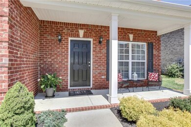 Relax on the lovely covered front porch. 