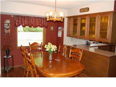 DINING AREA WITH WOOD LAMINATE FLOORING