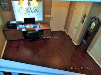 Living Room. Looking from stairwell towards front