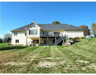 Exterior Back. Walkoout ranch.    Almost acre lot.