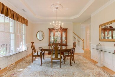 Formal Dining Room with Hardwood Floors and Tray C