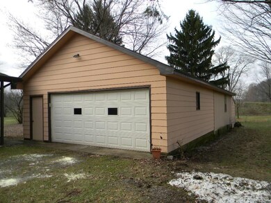Addition on back of garage has great workshop and 