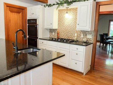 Kitchen has a walk-in pantry.