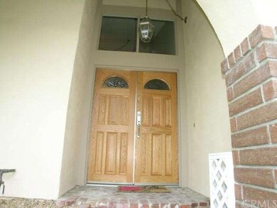 Ener through custom oak doors.