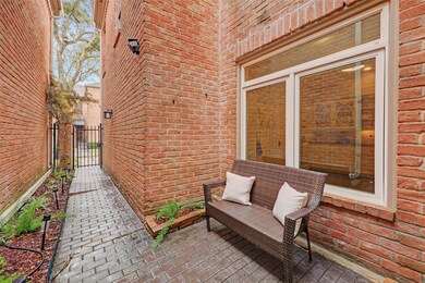 Private, gated entrance leads to front door.