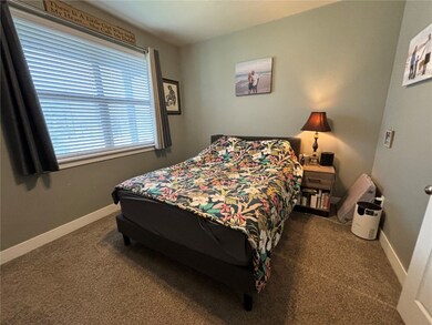 Bedroom with carpet flooring