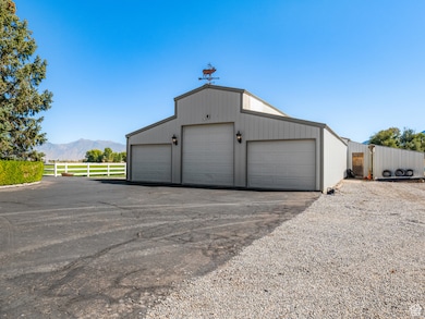 Detached garage featuring a mountain view