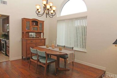 Dining room with hardwood flooring