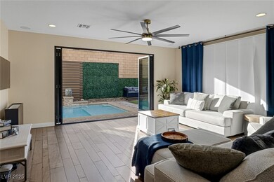 Living area with visible vents, recessed lighting,