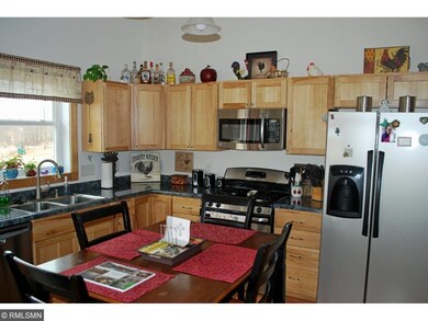 Well laid out kitchen with window at sink