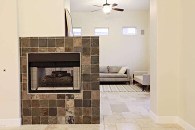 Living & Family Room w/ 2-way Fireplace