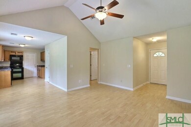 Family Room Open to Dining Room & Kitchen