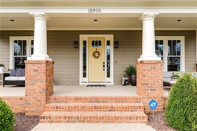 The aggregate front porch is perfect for a balmy S