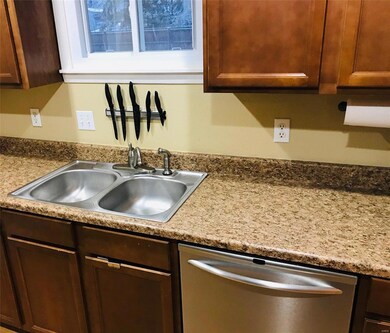 Updated cabinets and counter tops with stainless s