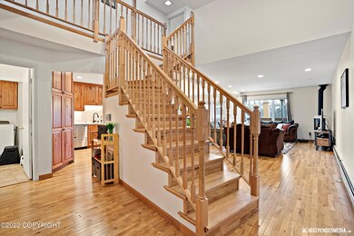 Vaulted Foyer with custom staircase