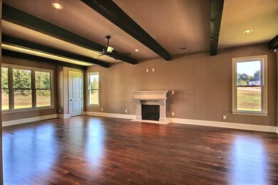 Beautiful hardwoods, natural light, very open conc
