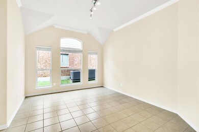 Empty room featuring plenty of natural light, lof