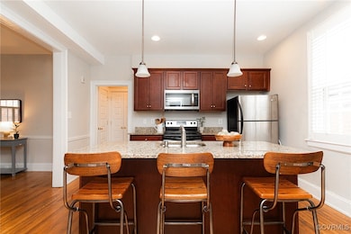 Kitchen featuring appliances with stainless steel