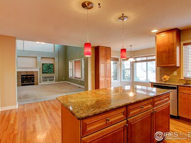 Granite Slab Island with Maple Cabinets