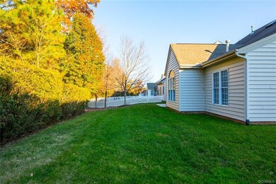 Beautifully landscaped yard throughout with privac