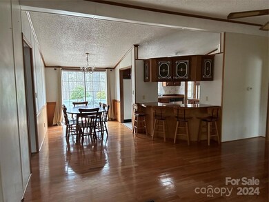 Dining area with breakfast bar and sliding glass door