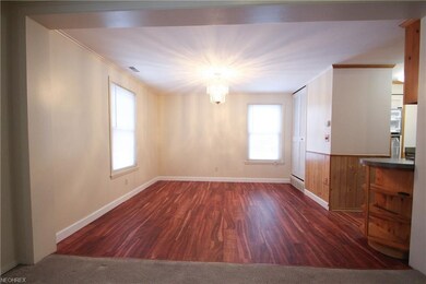 Dining room with new wood-look vinyl laminate floo