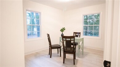 Dining area with plenty of natural light and light