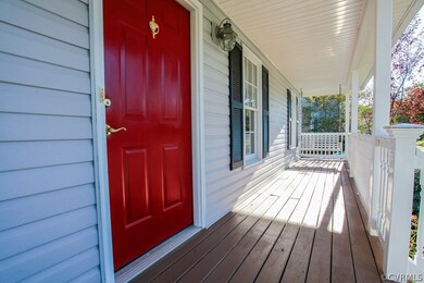 Lovely Country Porch with Swing and Low Maintenanc