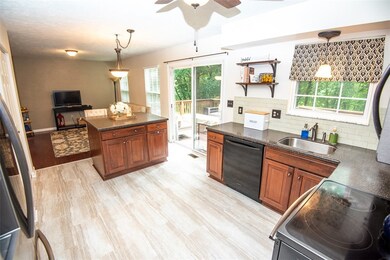 Kitchen has large island with seating.