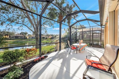View of patio with a water view and glass enclosur