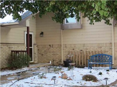 This is the front entry and it is nicely landscape