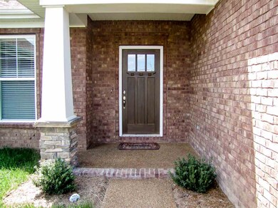 Nicely landscaped outside entry