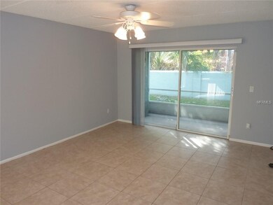 Living area opens to screened porch.