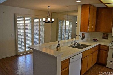 Kitchen and dining room look out to the patio.