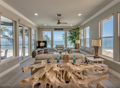 Living room with a wealth of natural light, ceilin