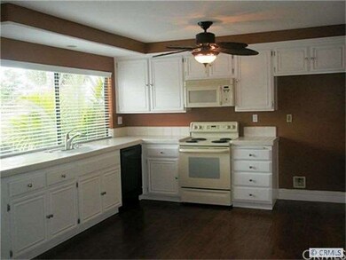 Kitchen opens to Family Room