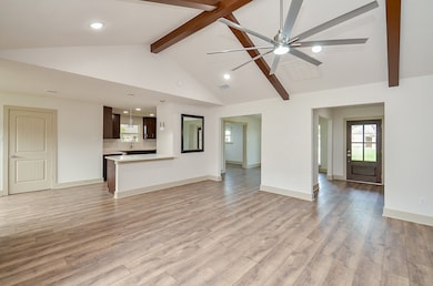This photo looks from the family room to front of
