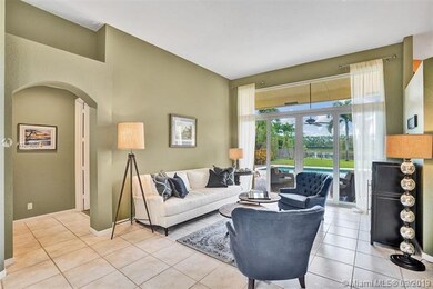 Living room overlooks the pool and lake