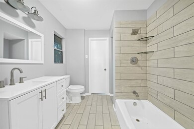 6602 Trumbull St, Houston, TX 77022 - photo 7