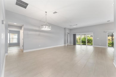Large living area with Tile flooring