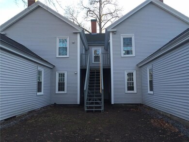 Back of building: entrance to...