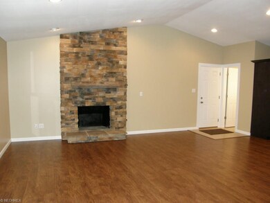 Door leads to 2CA & heated garage...tile entry & 1