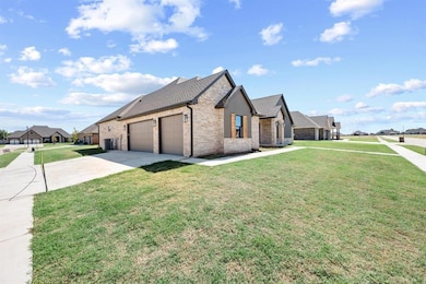 View of front of property with a front lawn and a 
