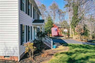 Side view of the driveway showing front entrance.