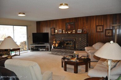Family room w/Wood burning Fireplace