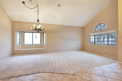 Formal living and dining room with bay window
