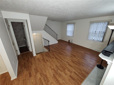 Living room from dining room corner.
