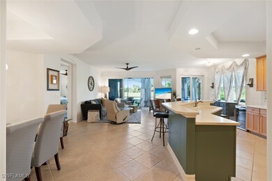 Kitchen with recessed lighting, a center island wi