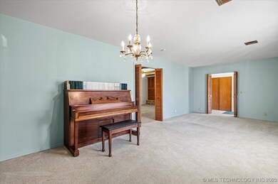 Piano remains in formal dining area. Note how this room can be closed off from the rest of the home.