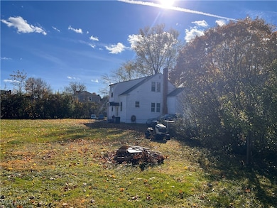 View of back yard and back side of the home.